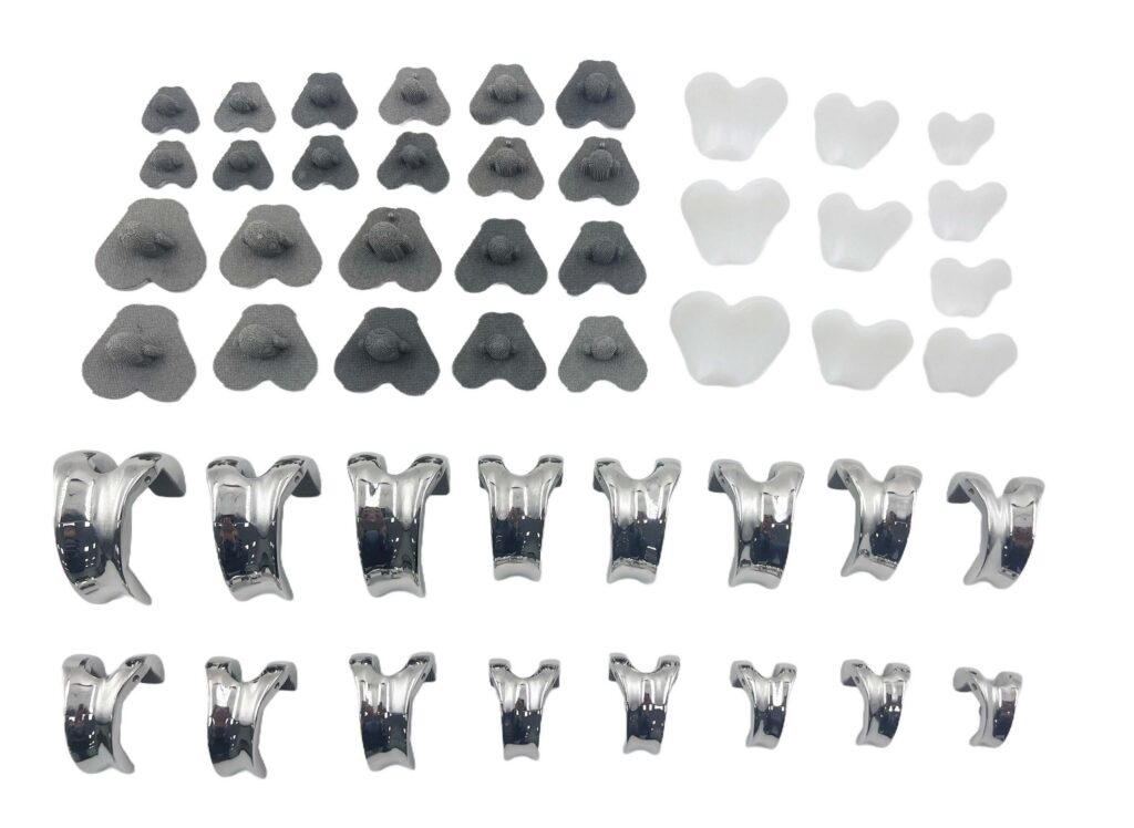 Vetmaster Small Animal Knee Joint Series components, featuring femoral condyle prosthesis and tibial plateau support with 3D-printed porous structure.